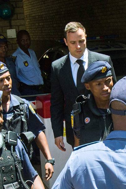 La sentenza  stata appena pronunciata. Oscar Pistorius esce dal tribunale per essere tradotto in carcere (Olycom)